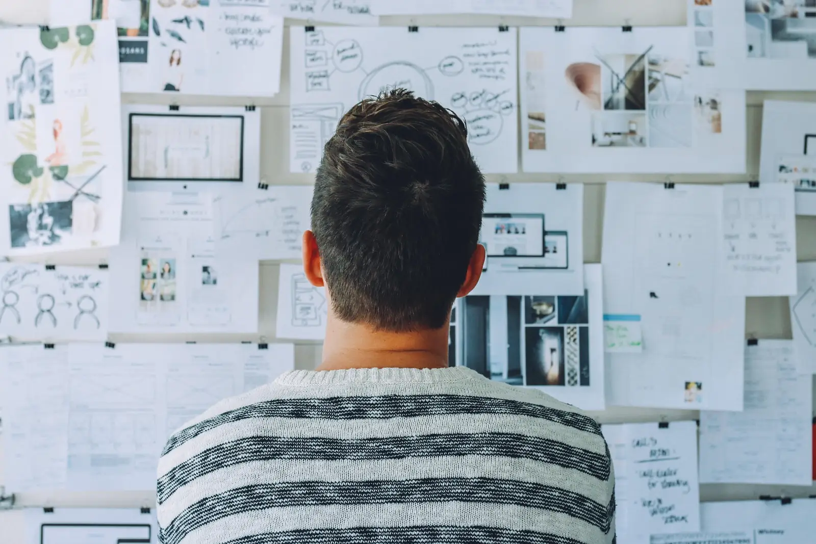 UX Designers collaborating on wireframes and prototypes